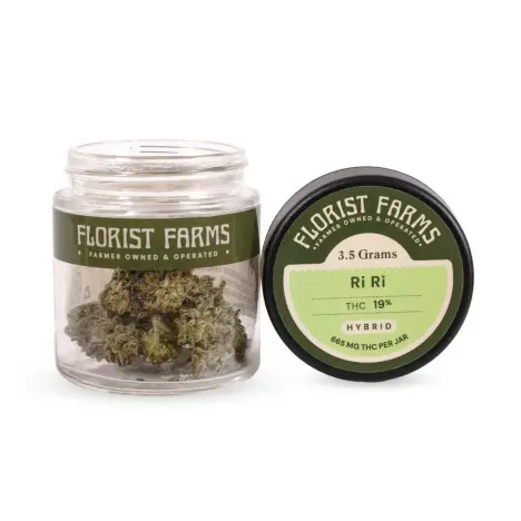 A clear glass jar and a black lid showing Florist Farms branded cannabis flower on a white background.