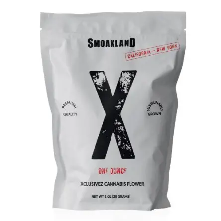 A white stand-up pouch featuring a large black "X" and the Smokeland brand logo.